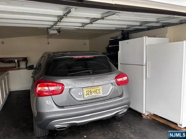 a view of storage and utility room with washer and dryer