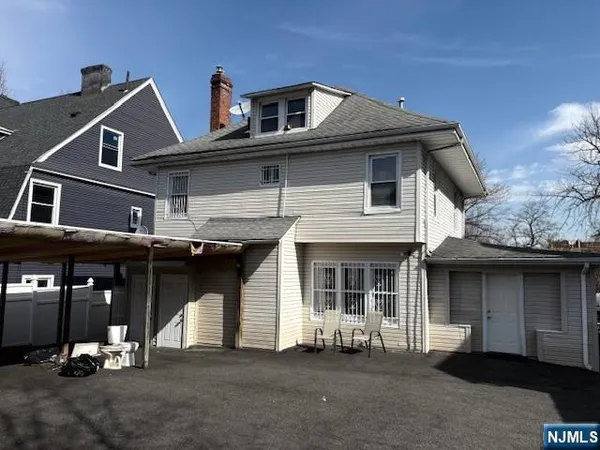 a front view of a house with parking