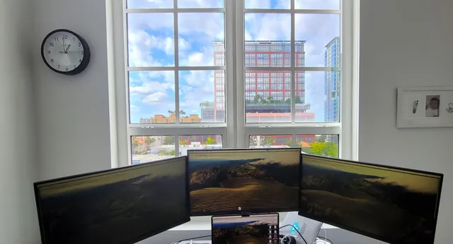 a living room with furniture rug and a window