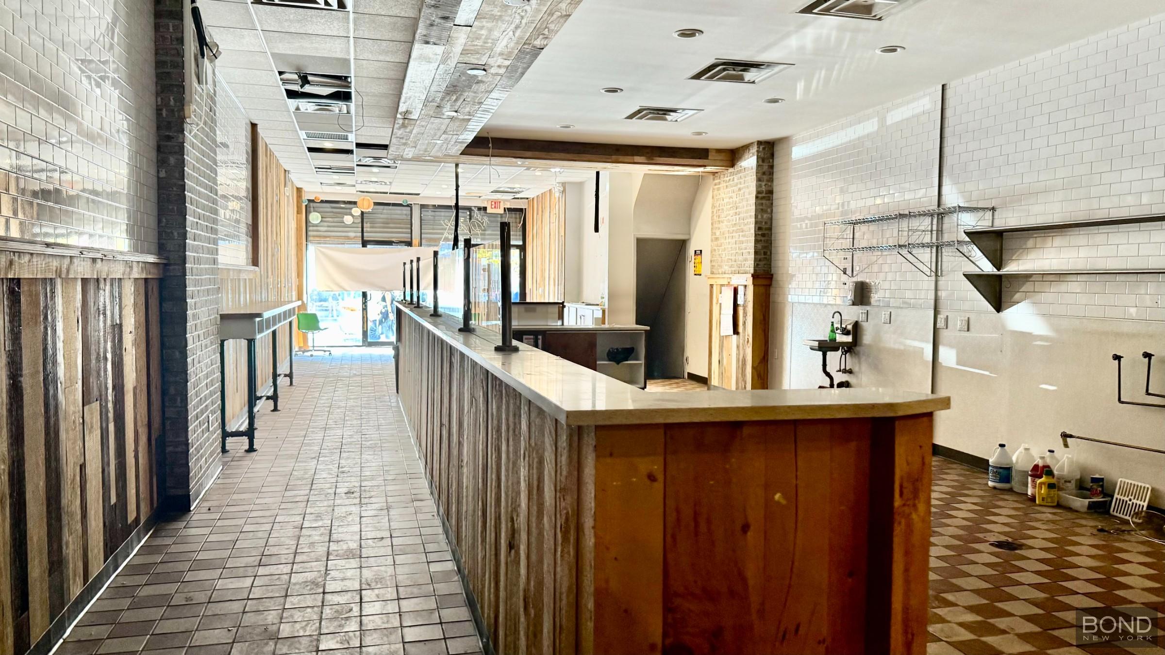 a view of a living room with a sink