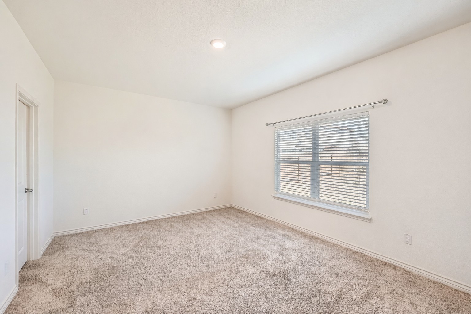 14513 Prairie Sod Lane Elgin, TX 78621 - Photo 14 of 36 an empty room with a window