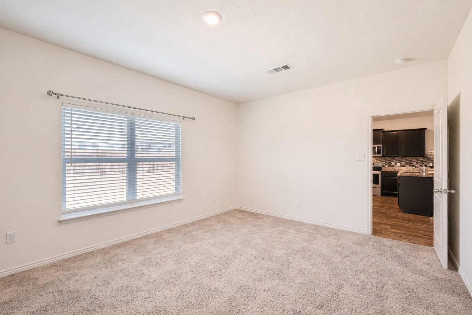 14513 Prairie Sod Lane Elgin, TX 78621 - Photo 16 of 36 a view of an empty room with a window