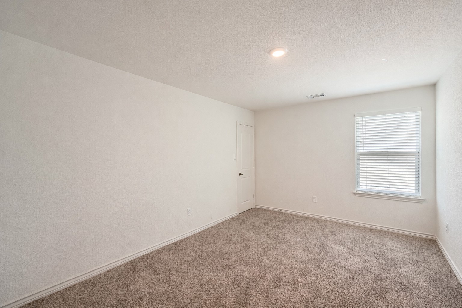 14513 Prairie Sod Lane Elgin, TX 78621 - Photo 22 of 36 an empty room with a window