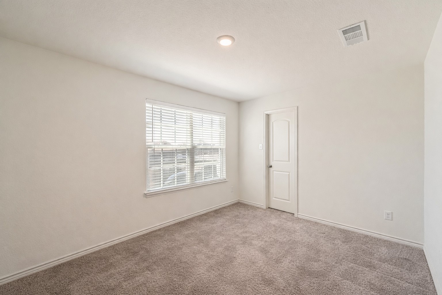14513 Prairie Sod Lane Elgin, TX 78621 - Photo 24 of 36 an empty room with a window