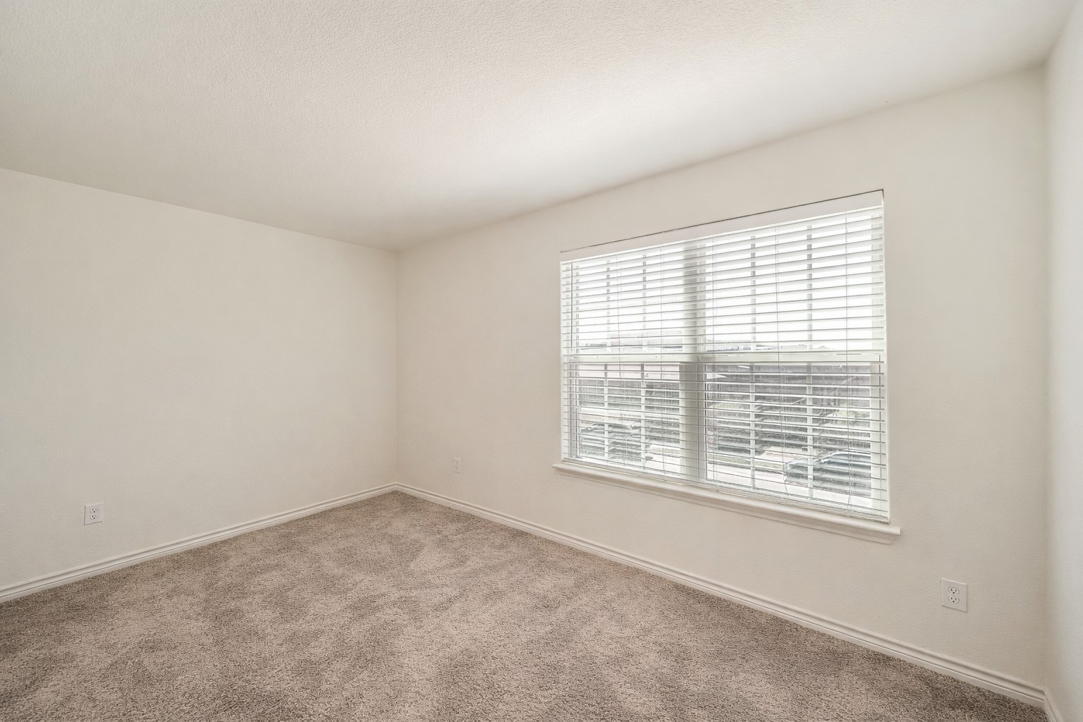 14513 Prairie Sod Lane Elgin, TX 78621 - Photo 25 of 36 an empty room with a window