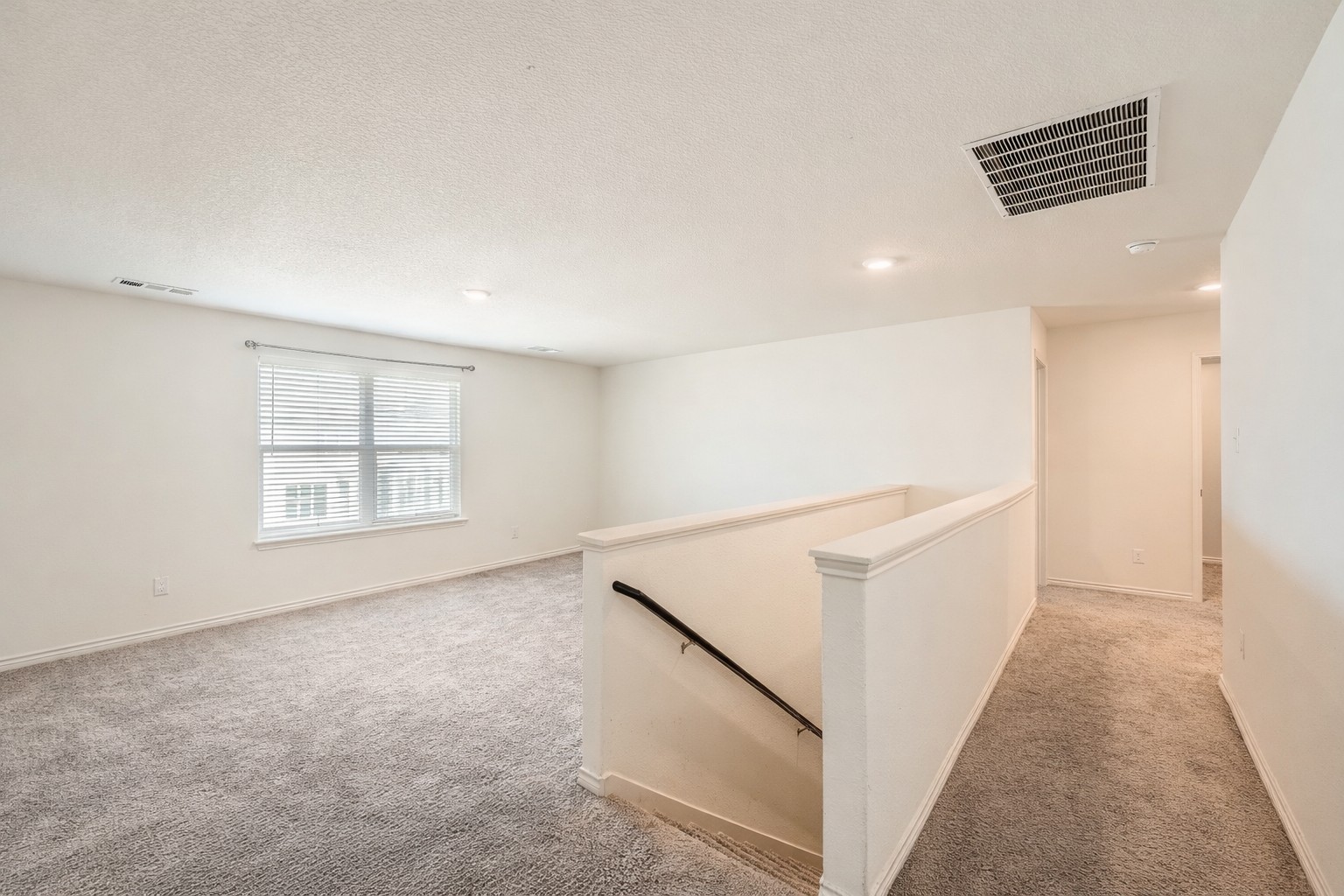 14513 Prairie Sod Lane Elgin, TX 78621 - Photo 29 of 36 a view of an empty room with windows
