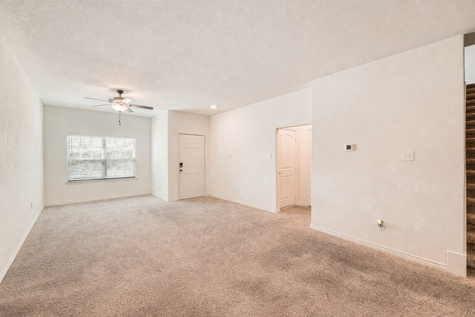 14513 Prairie Sod Lane Elgin, TX 78621 - Photo 7 of 36 a view of an empty room with a window