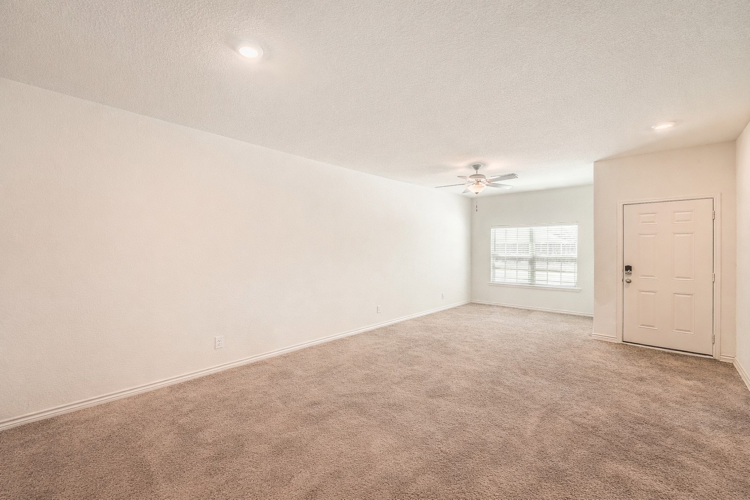 14513 Prairie Sod Lane Elgin, TX 78621 - Photo 8 of 36 an empty room with windows and closet