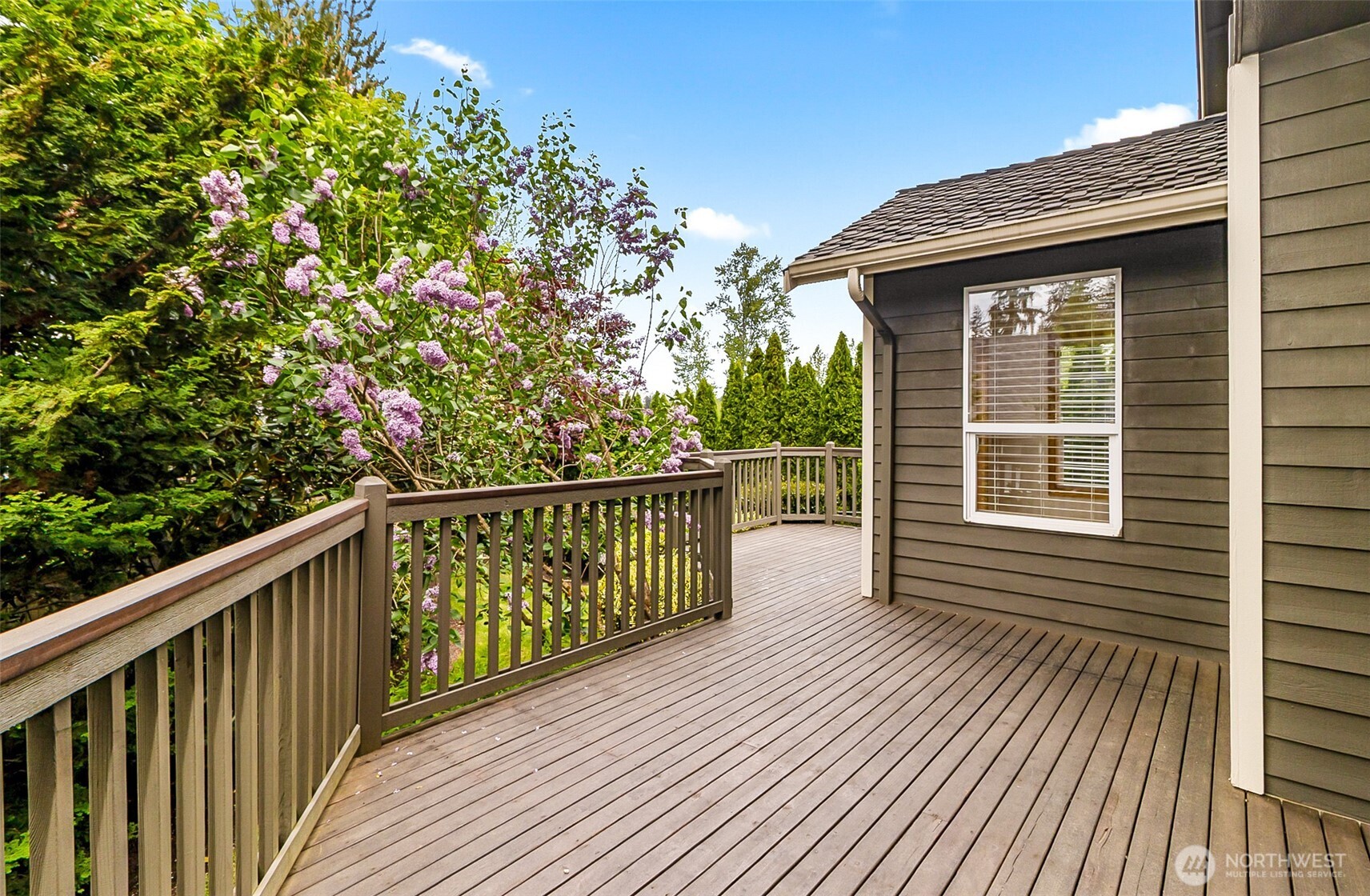 18410 11th Drive Southeast Bothell, WA 98012 - Photo 37 of 40 a balcony with wooden floor and fence