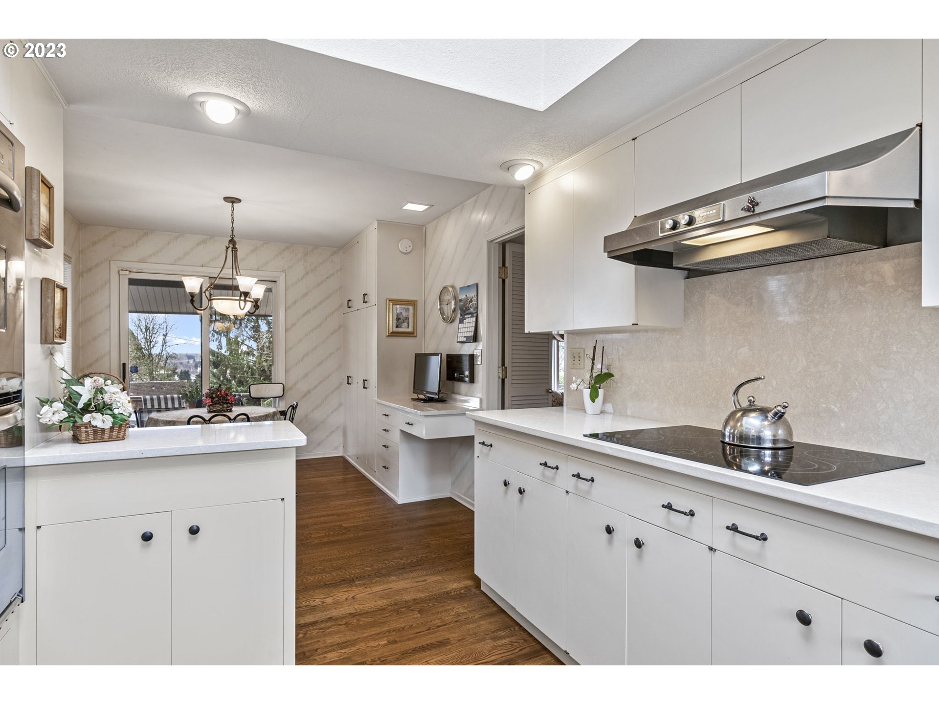2217 Cascade Way Longview, WA 98632 - Photo 13 of 32 a kitchen with a sink stainless steel appliances and cabinets