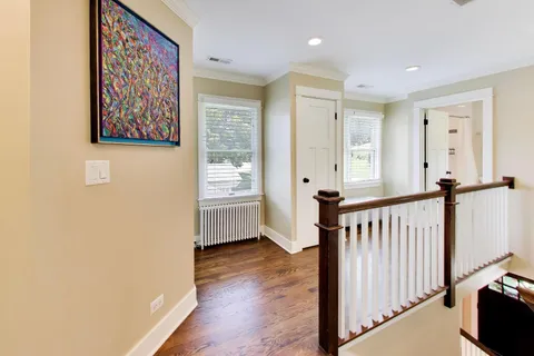 a view of entryway with wooden floor