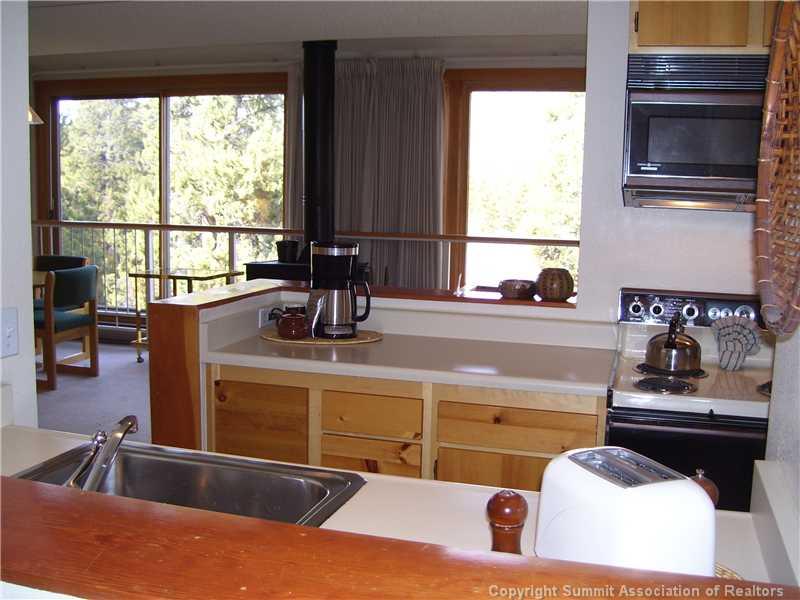 22340 Highway 6, Unit 1815 Keystone, CO 80435 - Photo 9 of 12 a kitchen with a sink and a window