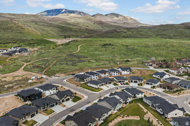 3349 Oxford Loop Morgan, UT 84050 - Photo 42 of 47 Aerial view of residential area featuring mountains