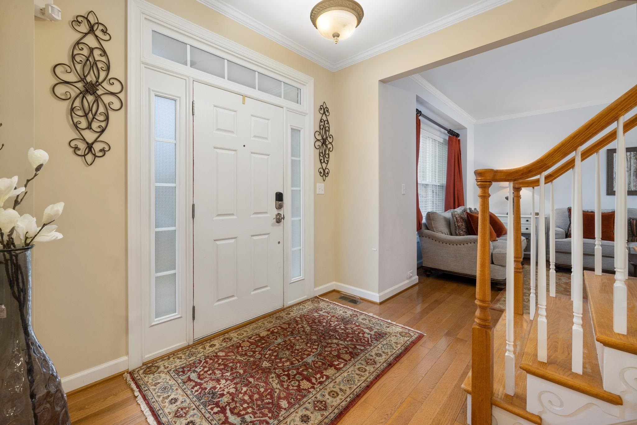 1621 Timber Wolf Drive Durham, NC 27713 - Photo 12 of 48 a view of a hallway to a livingroom with furniture