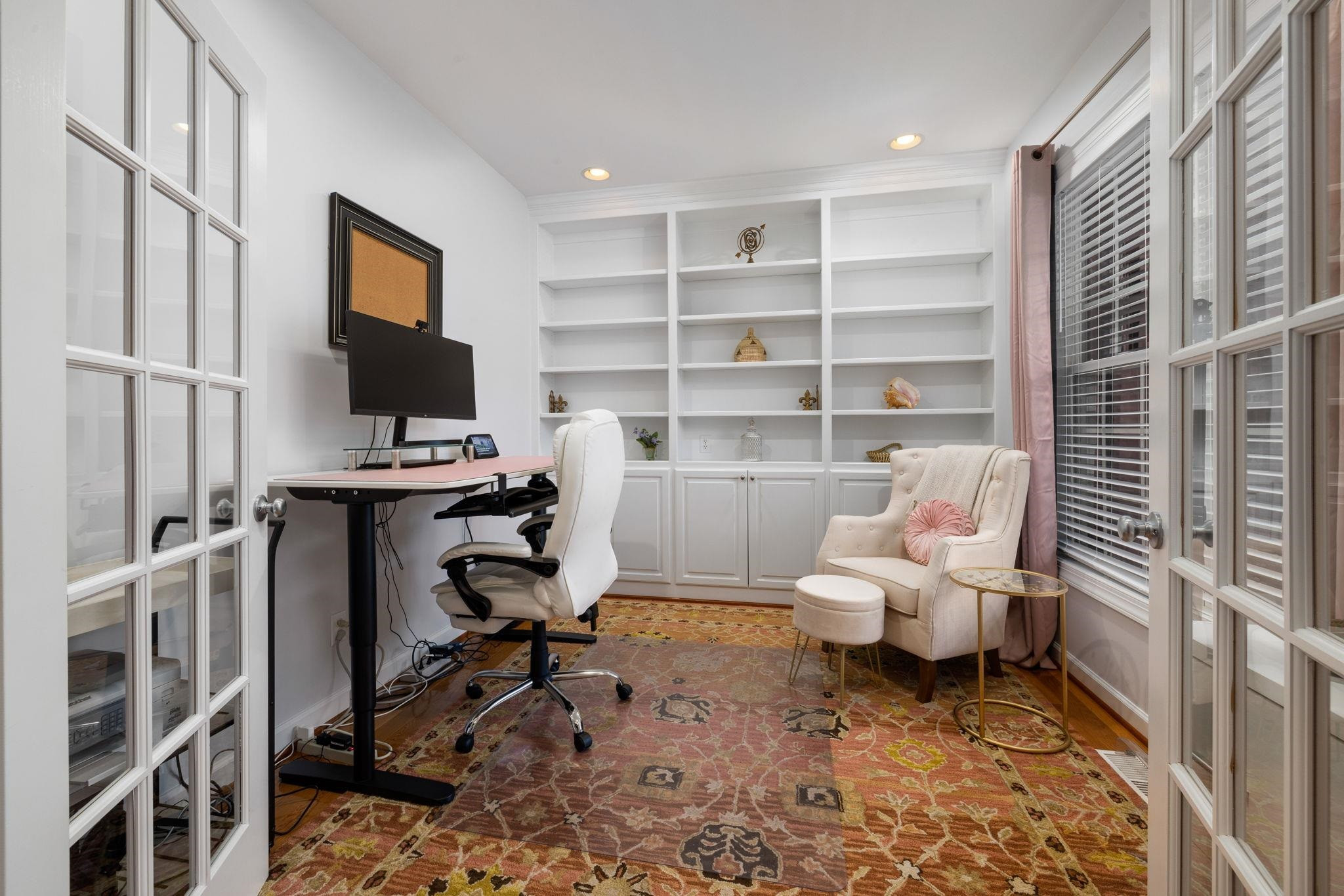 1621 Timber Wolf Drive Durham, NC 27713 - Photo 14 of 48 a living room with furniture a rug and a flat screen tv