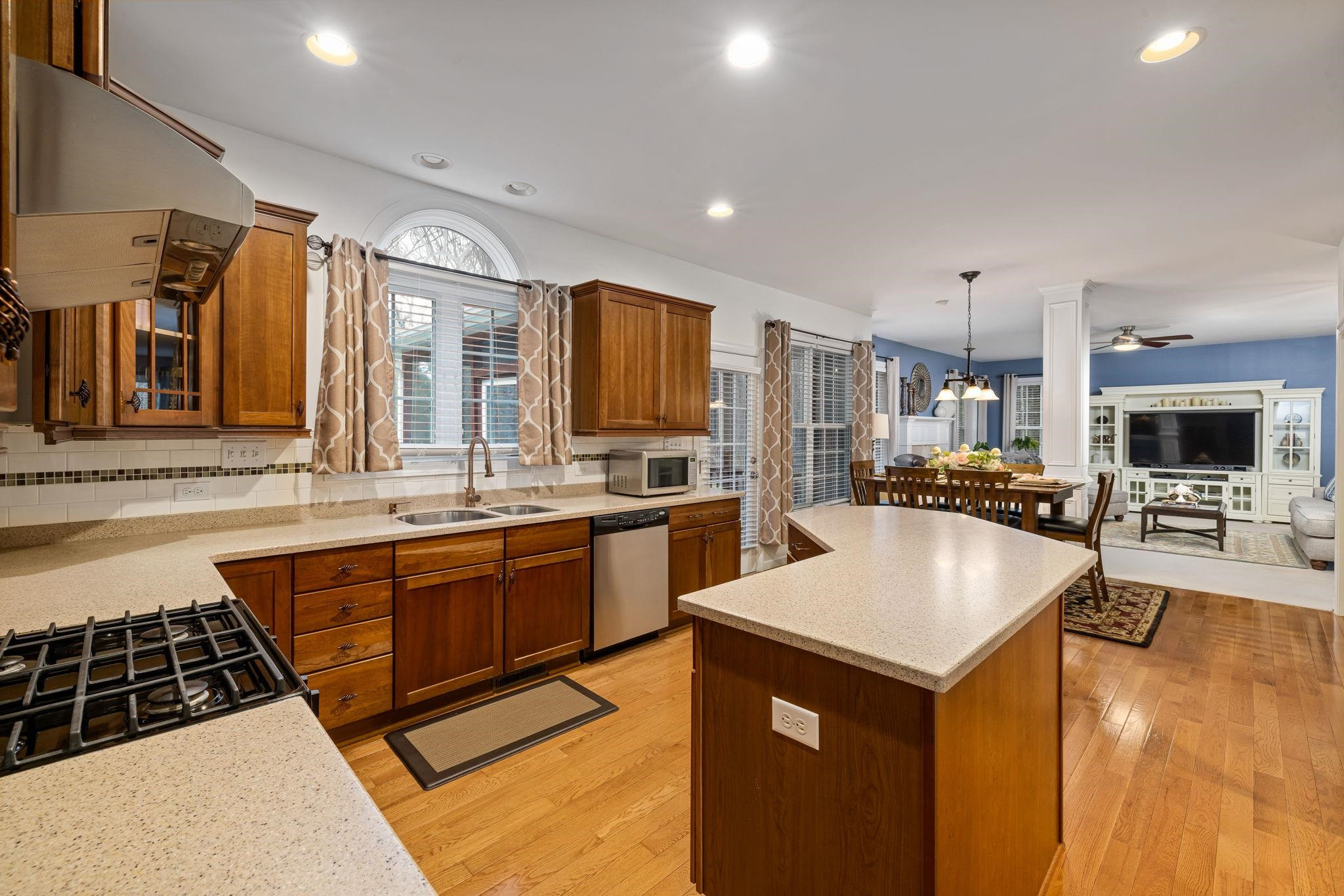1621 Timber Wolf Drive Durham, NC 27713 - Photo 21 of 48 a large kitchen with kitchen island a sink a counter top space stainless steel appliances and cabinets