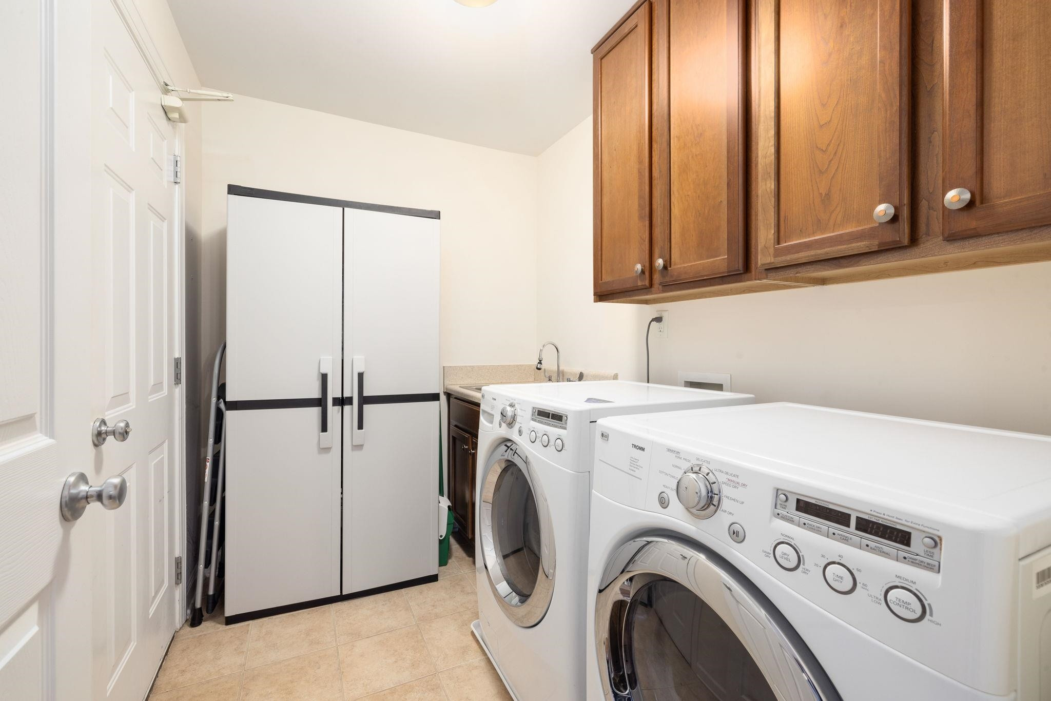1621 Timber Wolf Drive Durham, NC 27713 - Photo 23 of 48 a utility room with dryer and washer