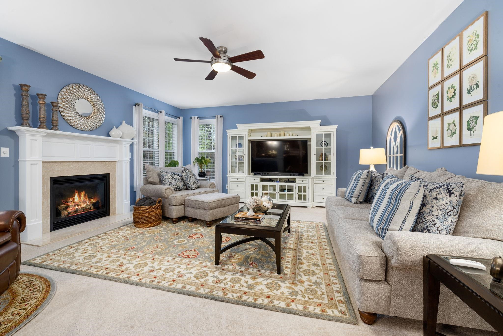 1621 Timber Wolf Drive Durham, NC 27713 - Photo 25 of 48 a living room with furniture and a fireplace