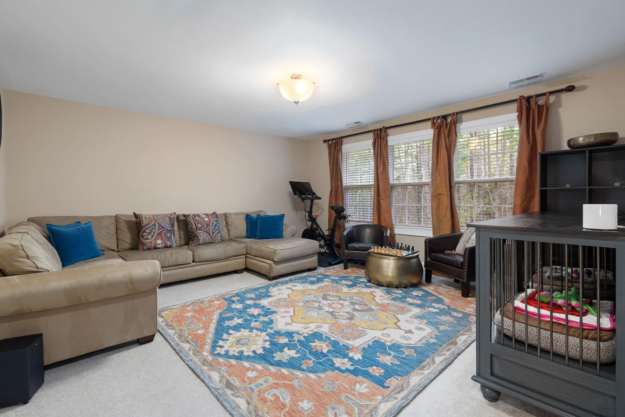 1621 Timber Wolf Drive Durham, NC 27713 - Photo 28 of 48 a living room with furniture and a large window