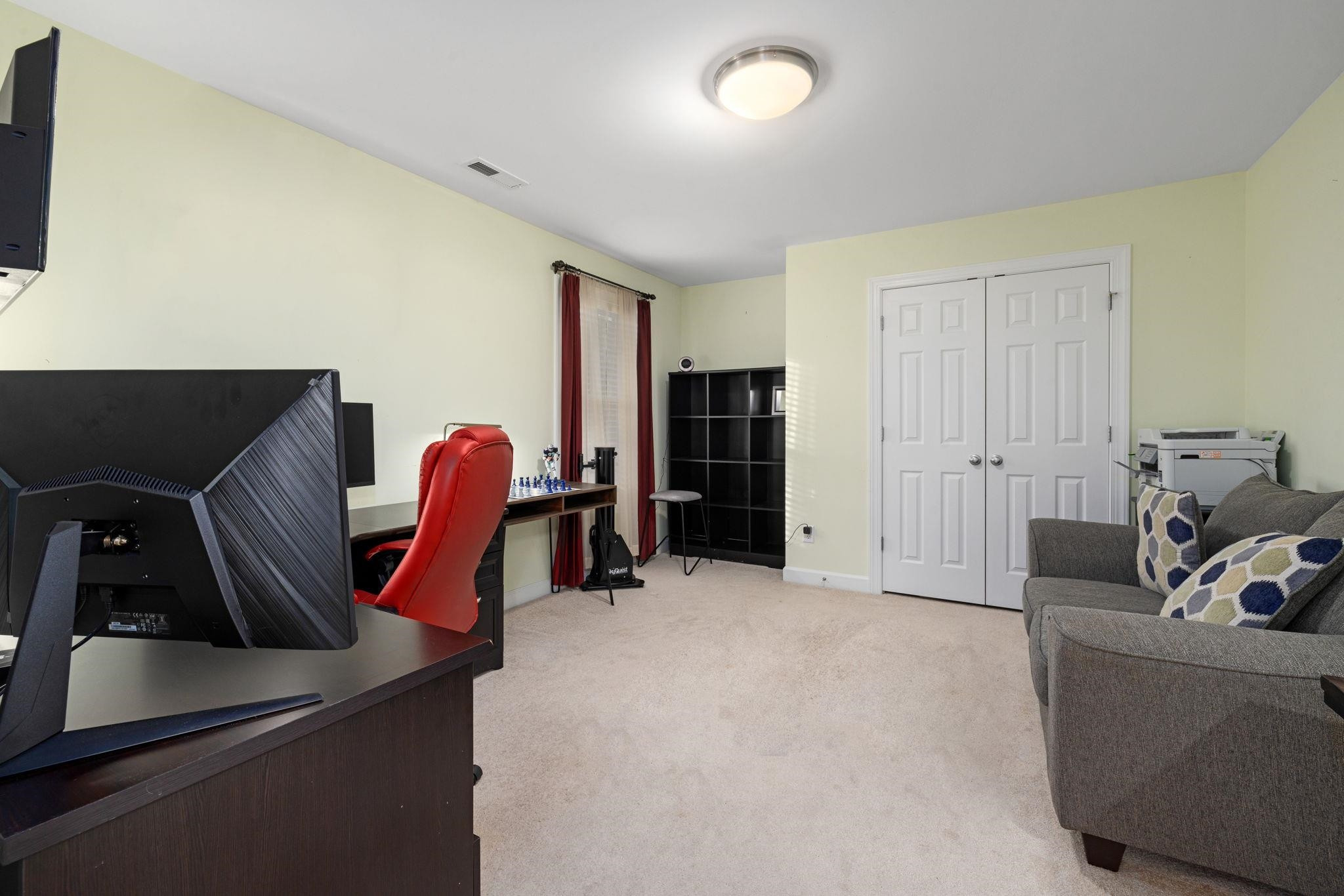 1621 Timber Wolf Drive Durham, NC 27713 - Photo 30 of 48 a view of a room with gym equipment