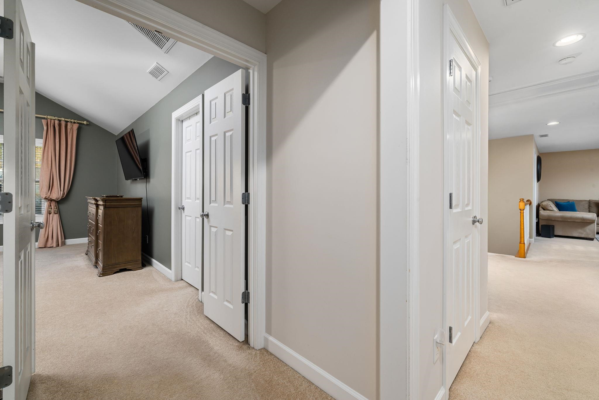 1621 Timber Wolf Drive Durham, NC 27713 - Photo 36 of 48 a view of a livingroom with furniture and a hallway