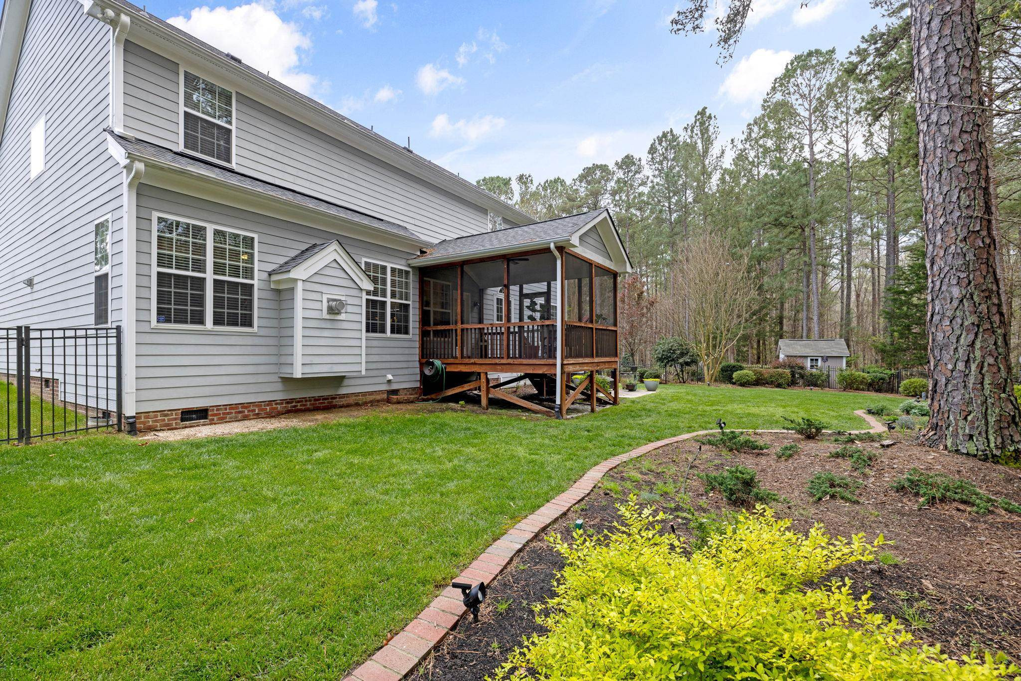 1621 Timber Wolf Drive Durham, NC 27713 - Photo 47 of 48 a view of a house with backyard