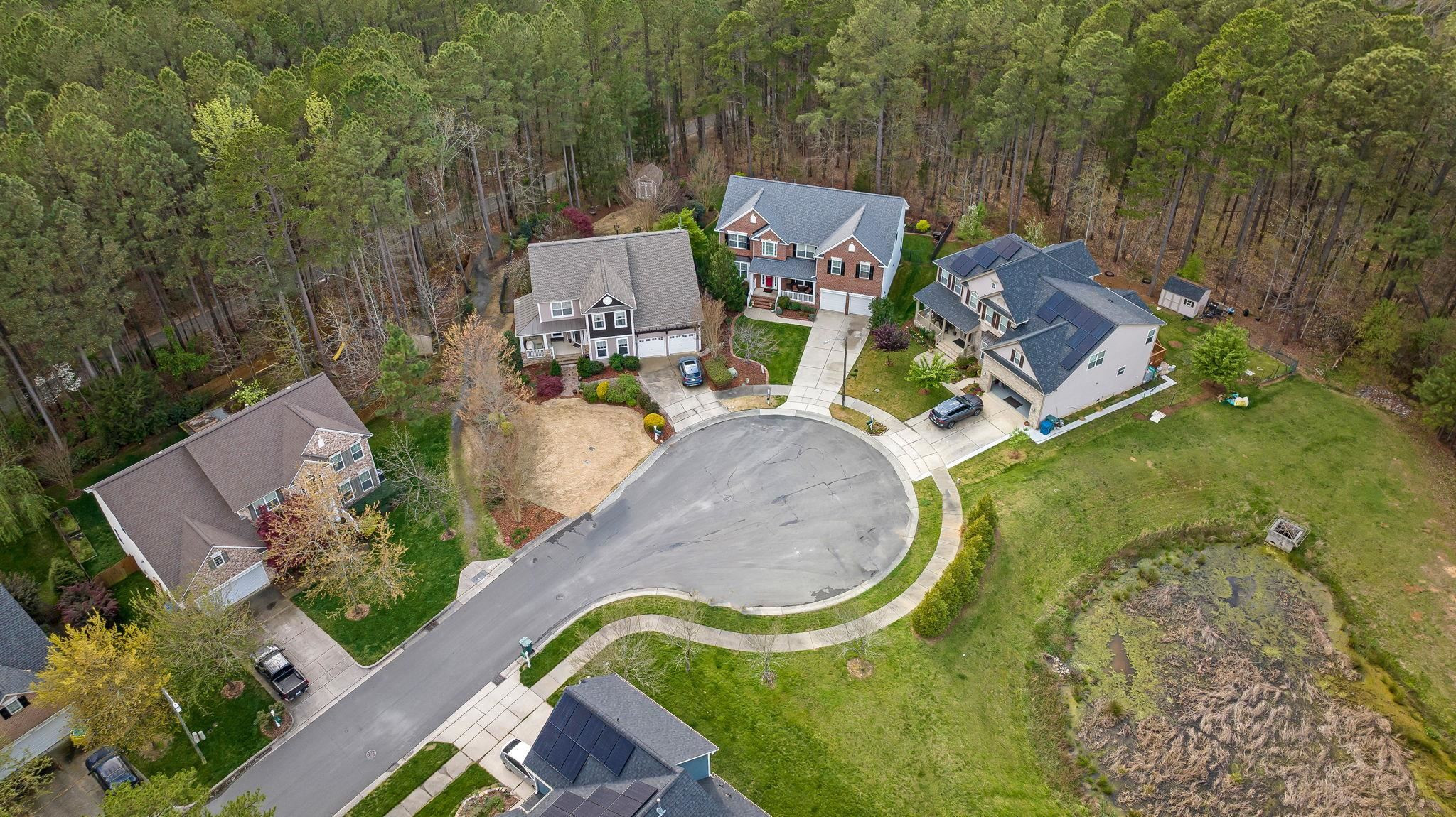 1621 Timber Wolf Drive Durham, NC 27713 - Photo 7 of 48 an aerial view of a house with swimming pool and outdoor space