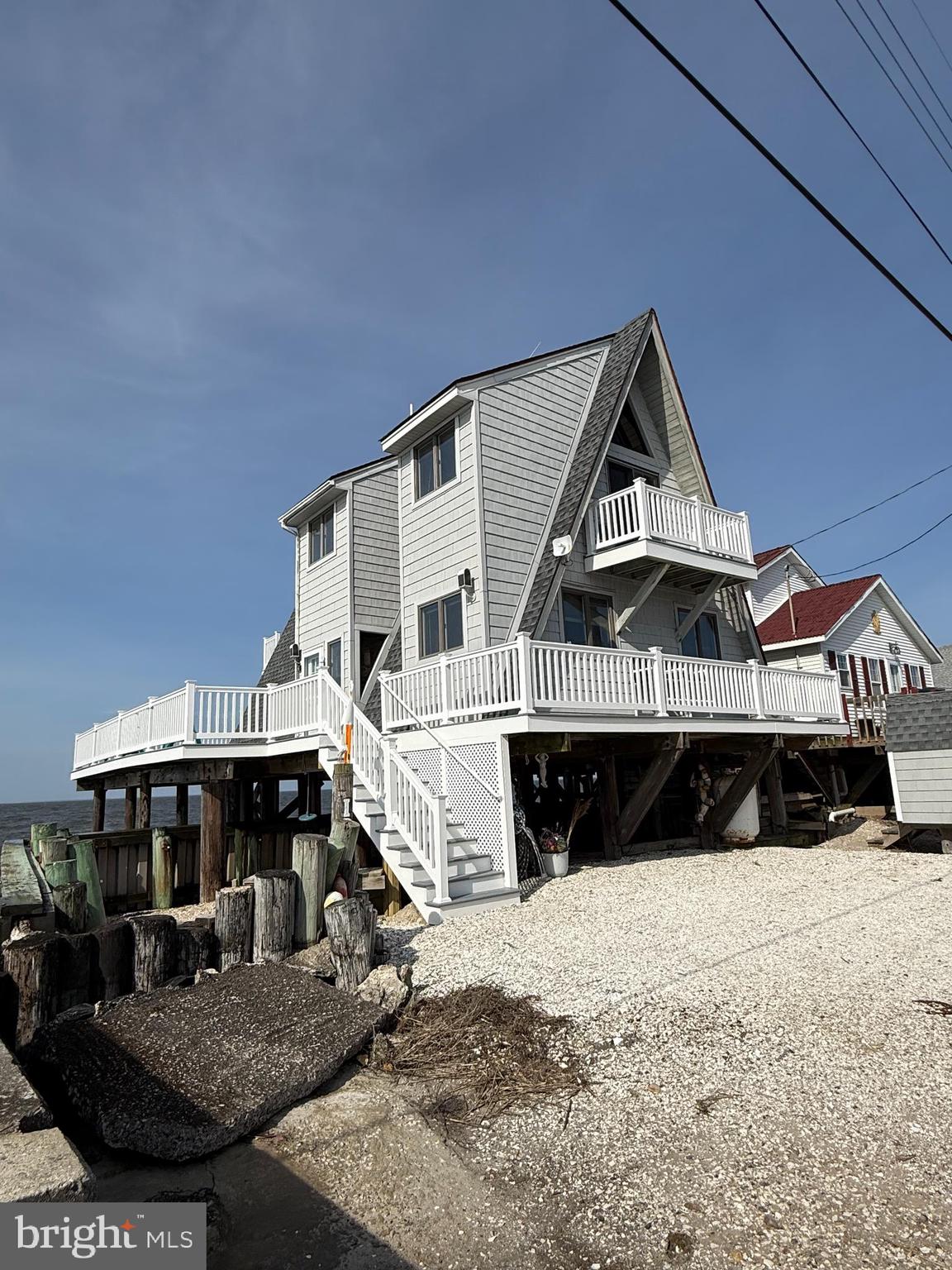 184 Cove Road Newport, NJ 08345 - Photo 30 of 41 a front view of a house with a yard and parking space