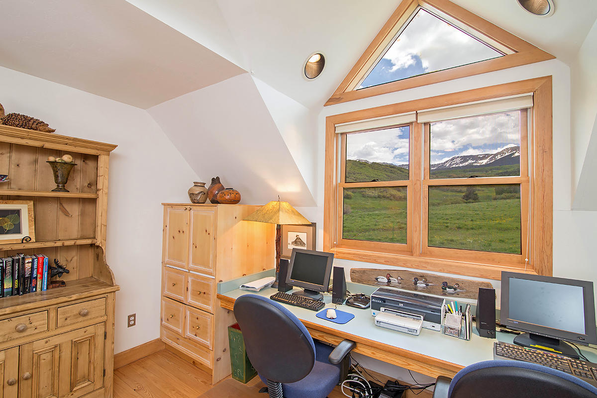 3520 County 58P Road Placerville, CO 81430 - Photo 32 of 76 a room with furniture and a window