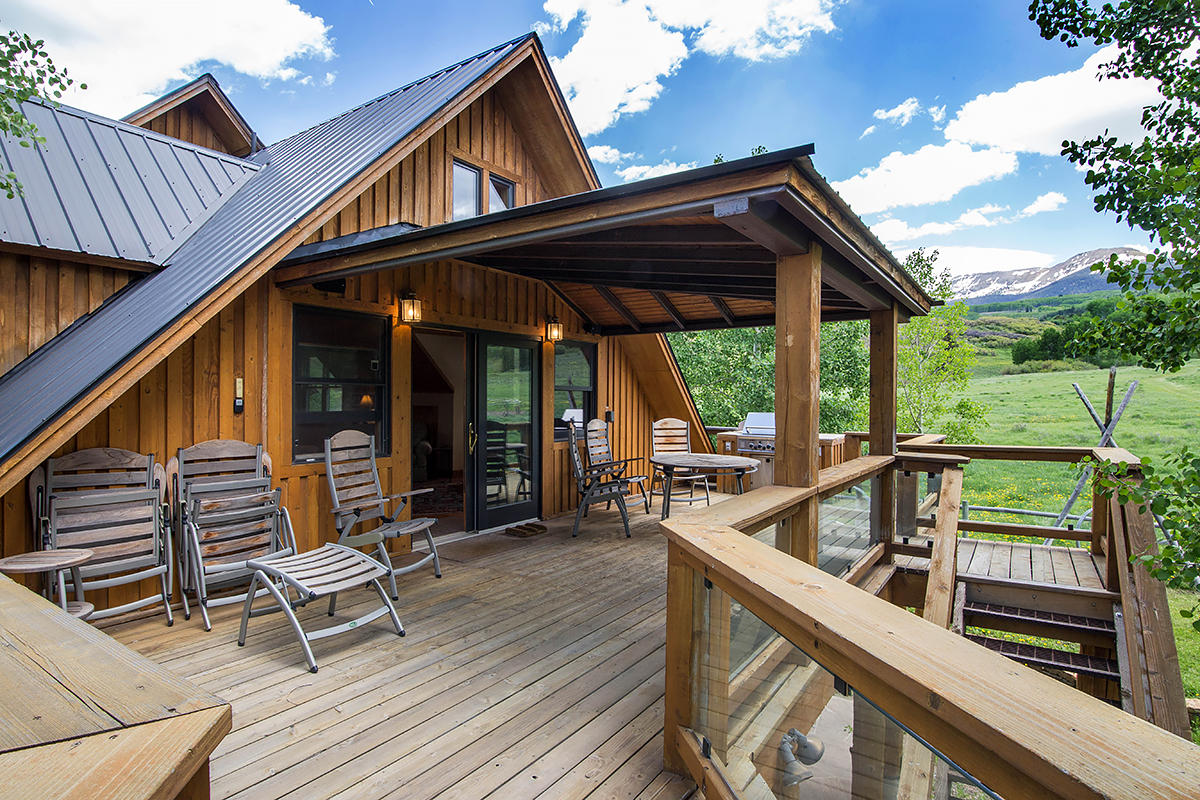 3520 County 58P Road Placerville, CO 81430 - Photo 35 of 76 a view of house with chairs and wooden floor