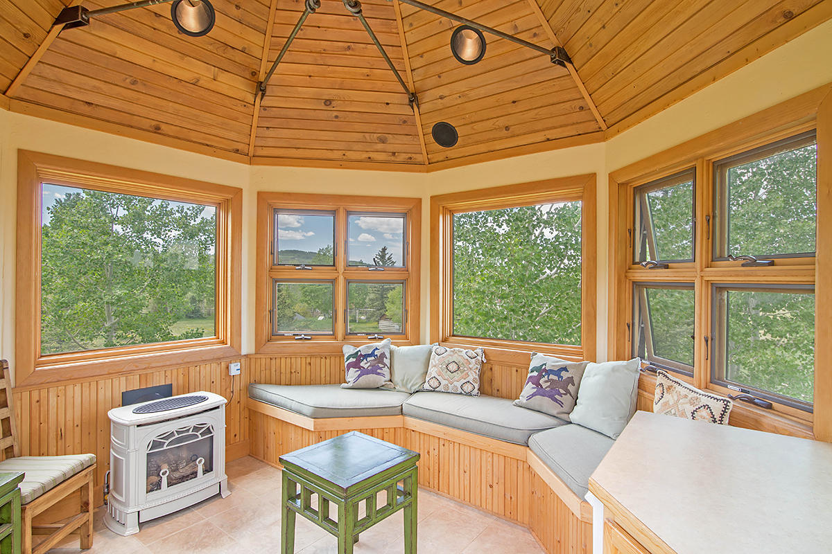 3520 County 58P Road Placerville, CO 81430 - Photo 37 of 76 a living room with furniture and a large window