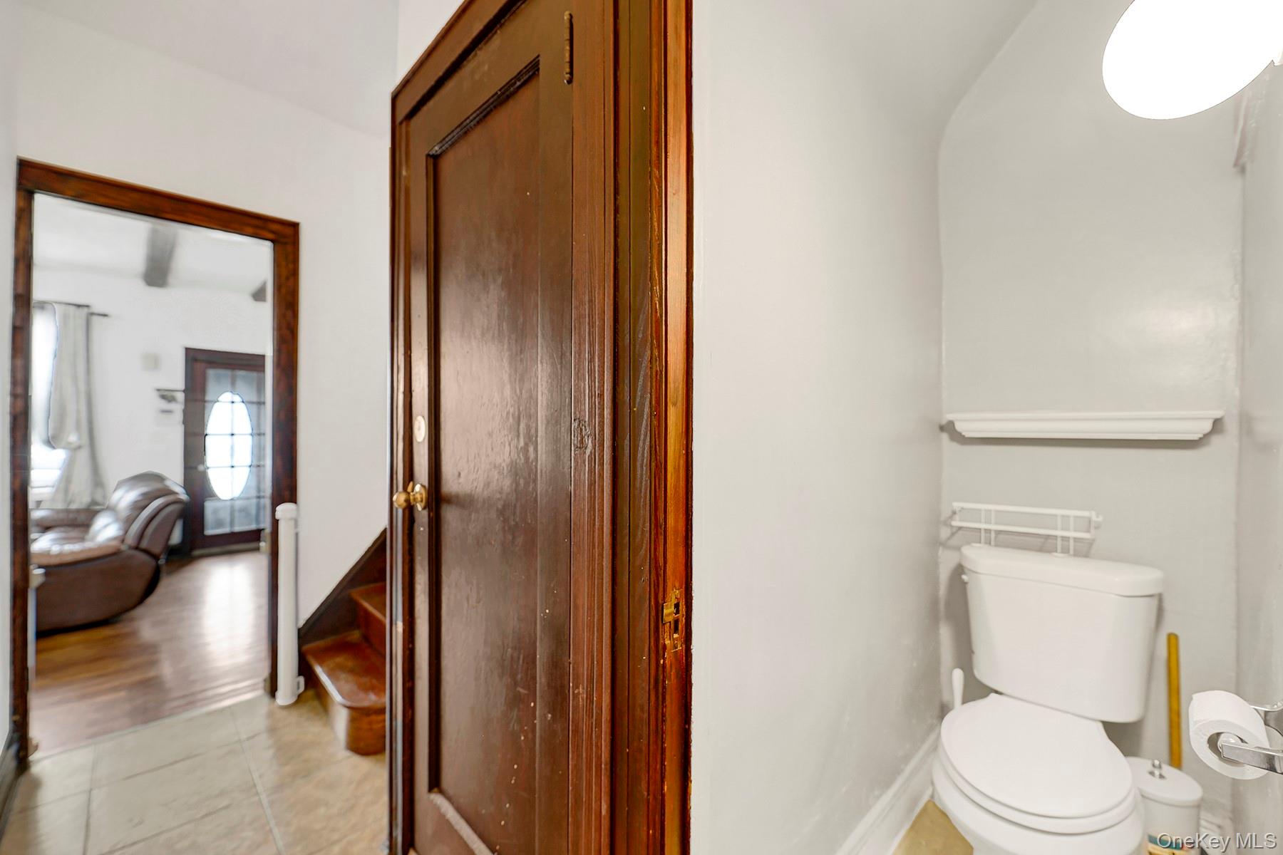 179-50 Anderson Road Queens, NY 11434 - Photo 19 of 23 Half bathroom featuring toilet and tile patterned flooring