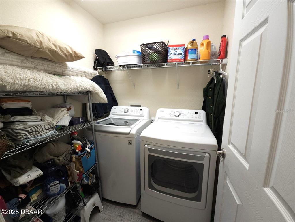 5023 Littlefield Road LaBelle, FL 33935 - Photo 15 of 36 a utility room with dryer and washer