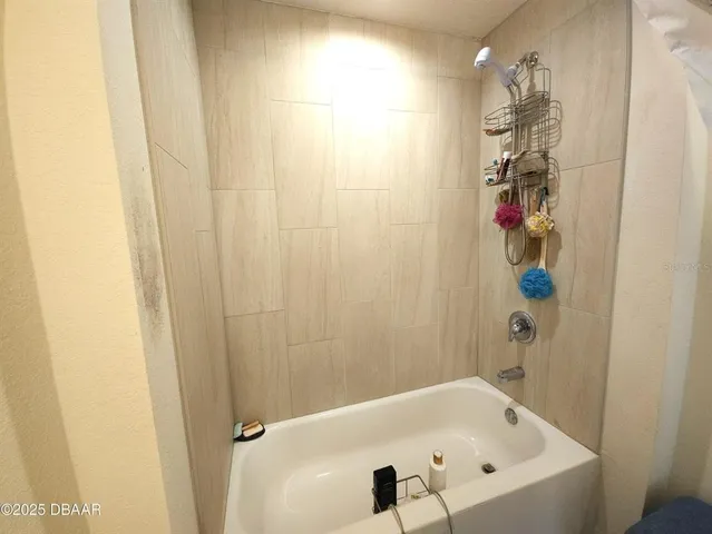 a bathroom with a bathtub