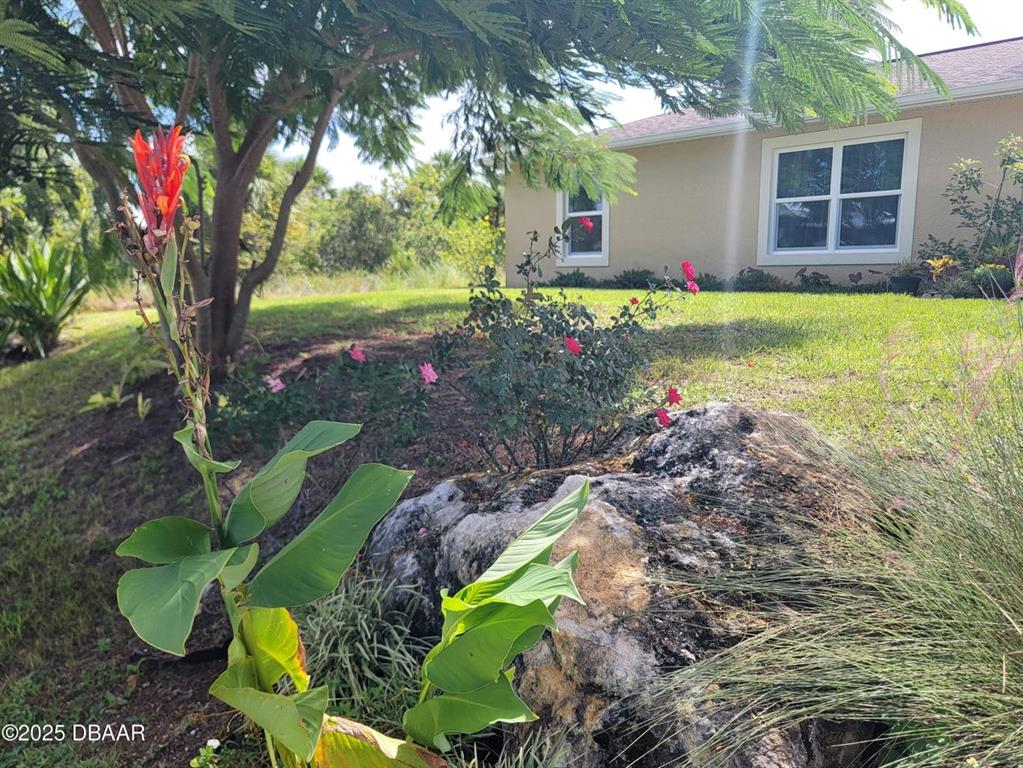 5023 Littlefield Road LaBelle, FL 33935 - Photo 2 of 36 a view of a house with backyard and sitting area
