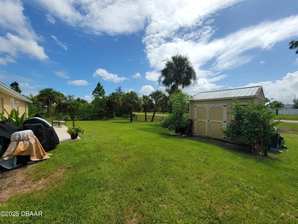 5023 Littlefield Road LaBelle, FL 33935 - Photo 32 of 36 a view of a garden and basketball court