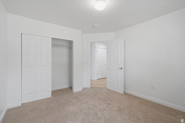 791 East Saddle Road Grantsville, UT 84029 - Photo 23 of 46 Interior room featuring neutral carpeting and white walls