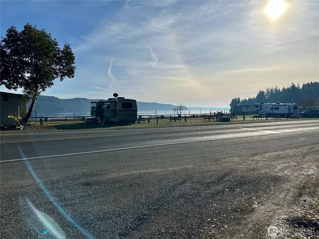 a view of a town with mountains in the background