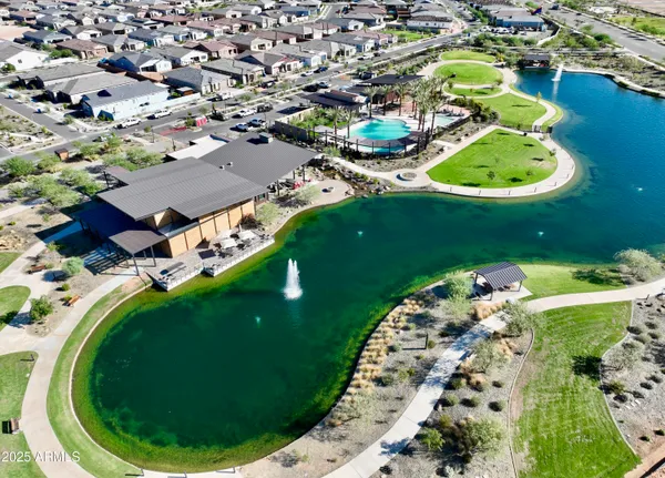 an aerial view of a swimming pool and outdoor space