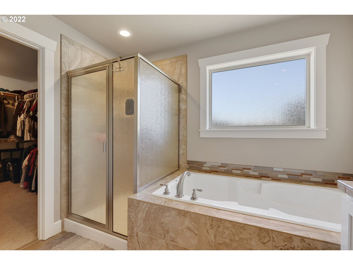 1845 South 14th Court Ridgefield, WA 98642 - Photo 22 of 32 a bathroom with a bathtub and a shower