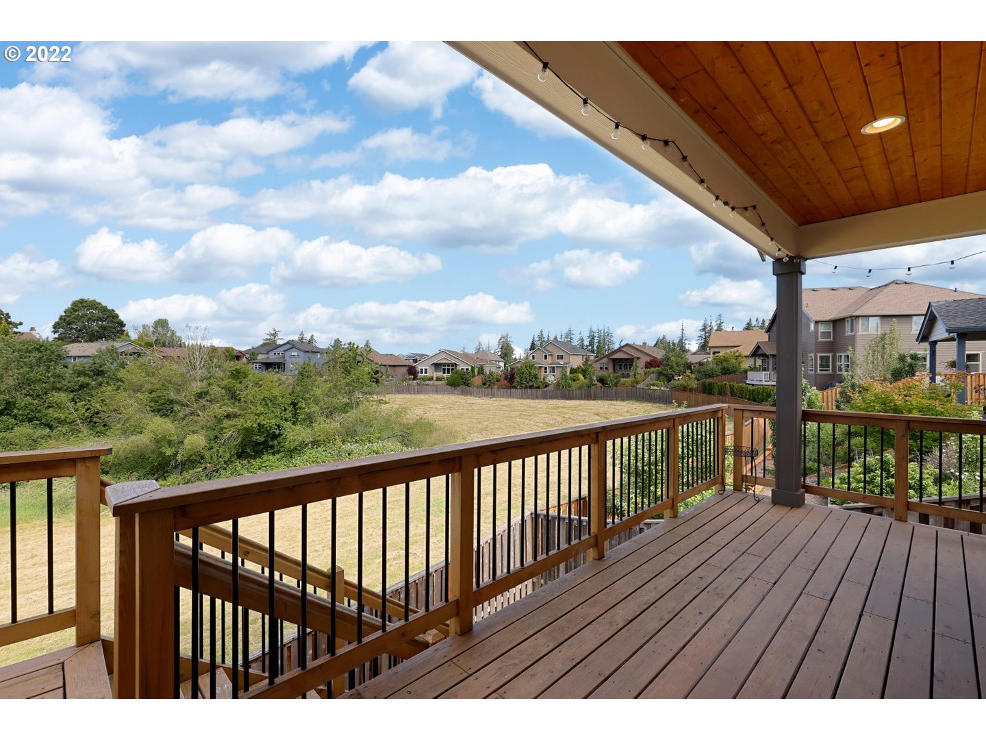 1845 South 14th Court Ridgefield, WA 98642 - Photo 29 of 32 a balcony with wooden floor and city view