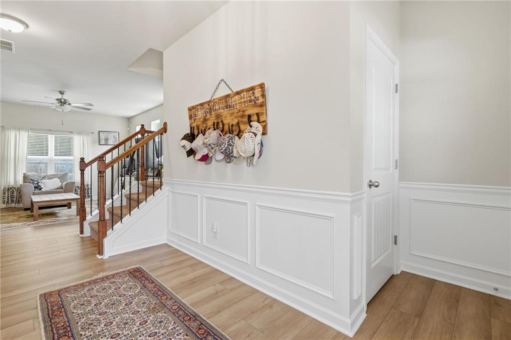 123 Renford Road Ball Ground, GA 30107 - Photo 4 of 27 a view interior of a house with wooden floor and stairs