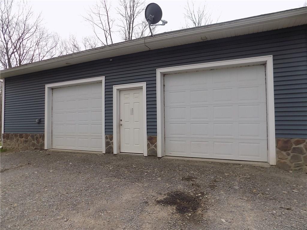 52 5 Points Road Sandy Lake, PA 16145 - Photo 2 of 24 This two and a half car garage has lots of space!