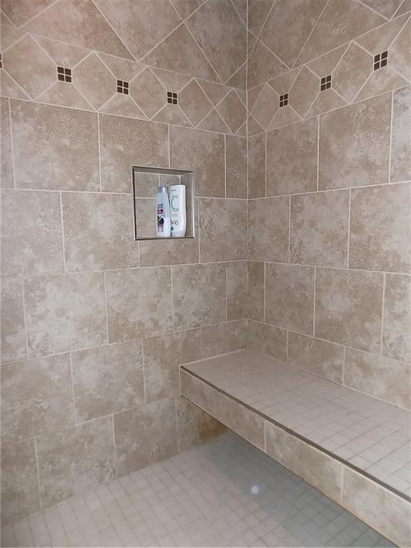 52 5 Points Road Sandy Lake, PA 16145 - Photo 12 of 24 Tiled over sized shower with built in bench!
