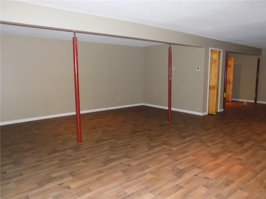 52 5 Points Road Sandy Lake, PA 16145 - Photo 18 of 24 Open family room in basement.