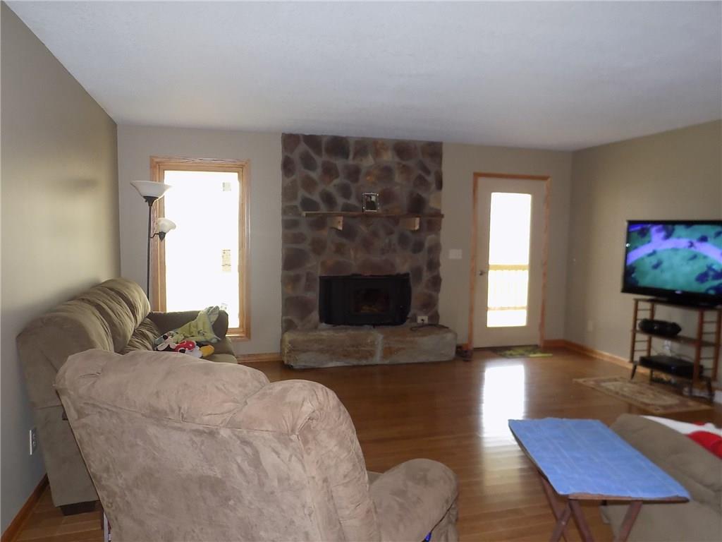 52 5 Points Road Sandy Lake, PA 16145 - Photo 3 of 24 Open floor plan with the living room, dining area, and kitchen all in one open space.