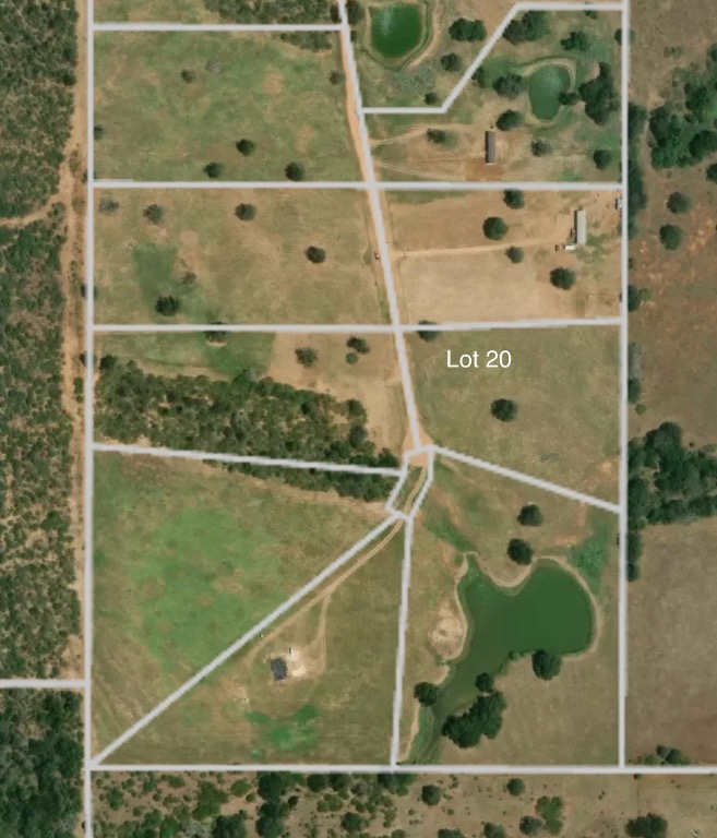 921 Johnson Farms Road Harwood, TX 78632 - Photo 8 of 8 a bathroom with a glass shower door