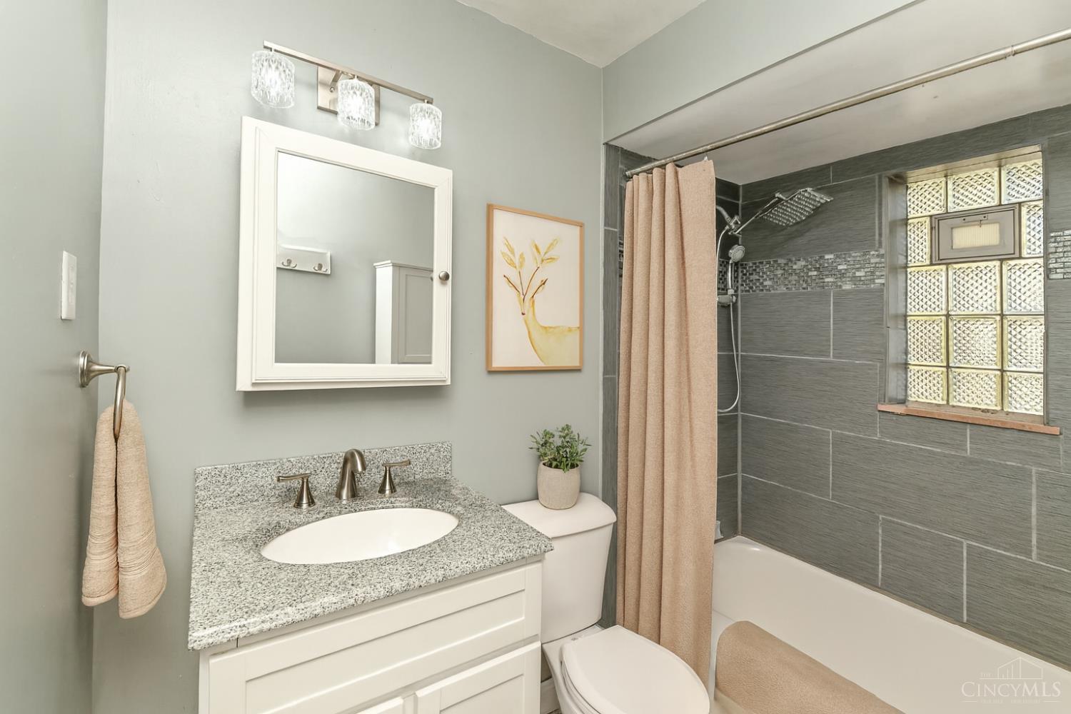 5618 Leumas Road Cincinnati, OH 45239 - Photo 18 of 48 Virtually staged first floor full bathroom.