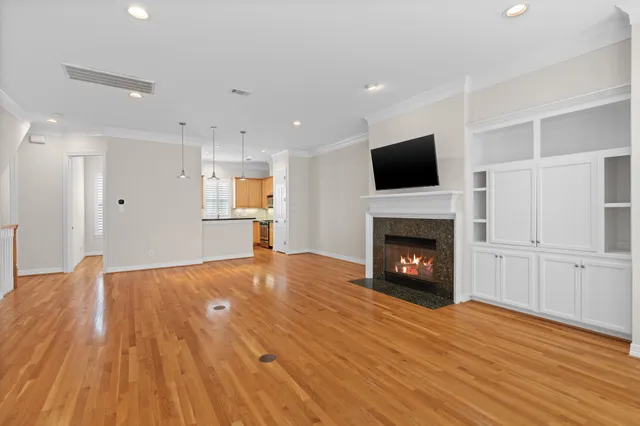a view of a livingroom with a fireplace and a fireplace