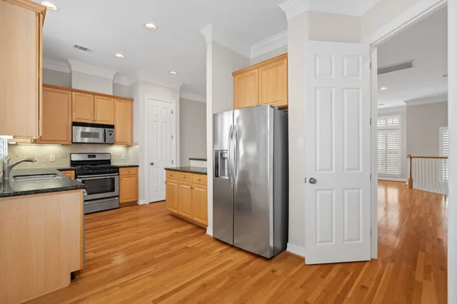 a view of a hallway with entryway